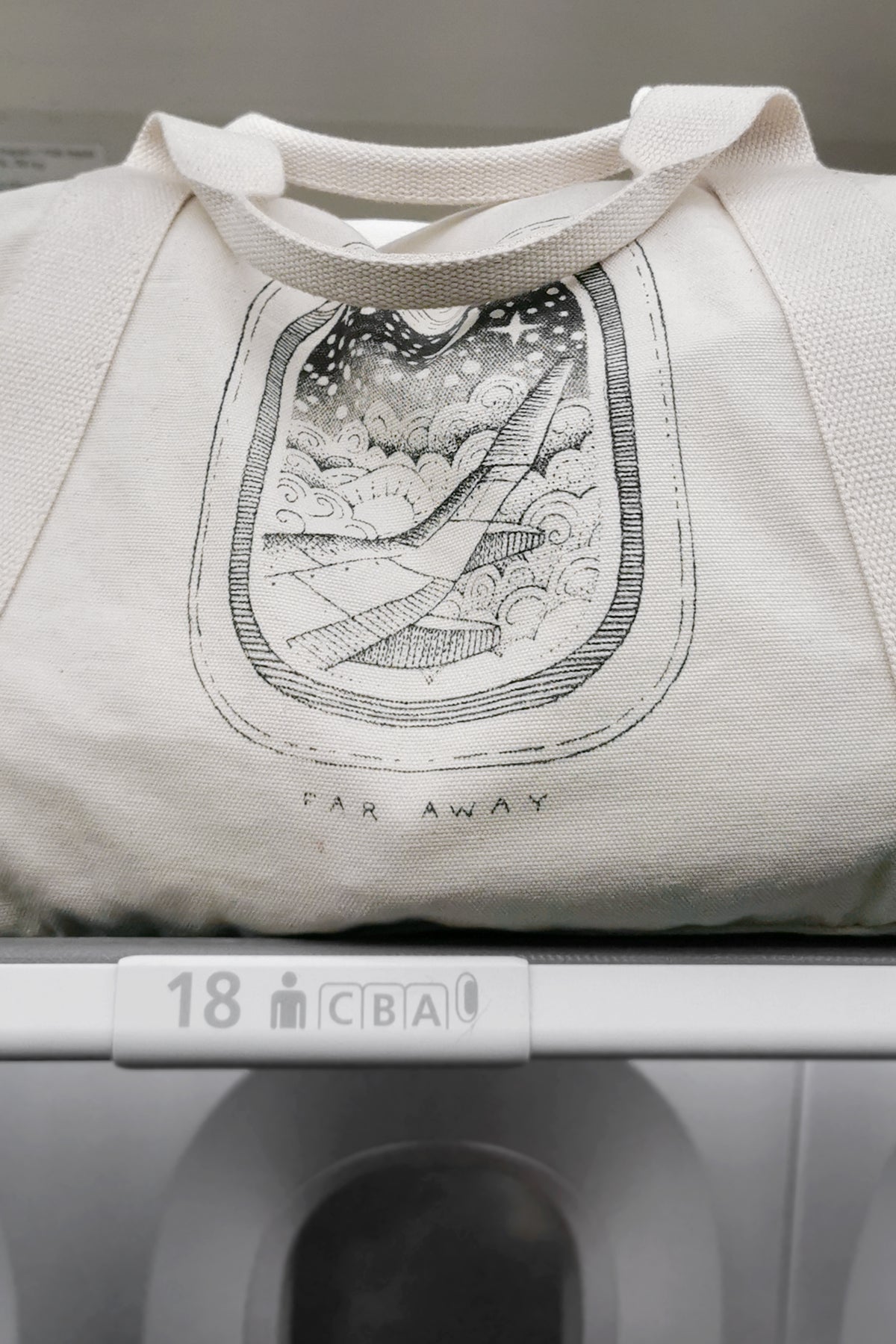Load image into Gallery viewer, Off-White Duffle Bag With Plane and Moon Illustration as hand luggage
