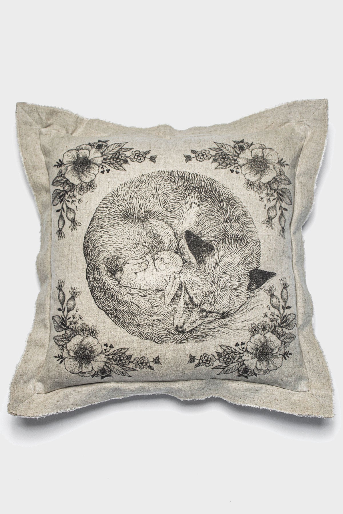  A linen cushion, hand made in Bali. This pillow is made from the off cuts of our BIG HUG Blanket. It features a raw-edge framed trim and a natural texture. It belongs anywhere you cuddle, a sofa, chaise, or bed. This pillow is illustrated by Suflanda features a fox lovingly taking care of a little rabbit. Perfect as a gift!
