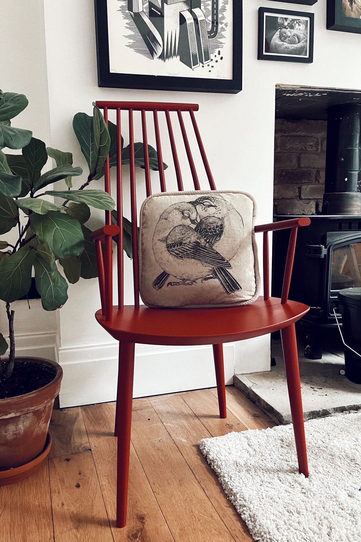 Laden Sie das Bild in den Galerie-Viewer, Beautiful Lovebird Cushion by Hello Big Hug  arranged on a chair. Illustration by Tattoo Artist Suflanda

