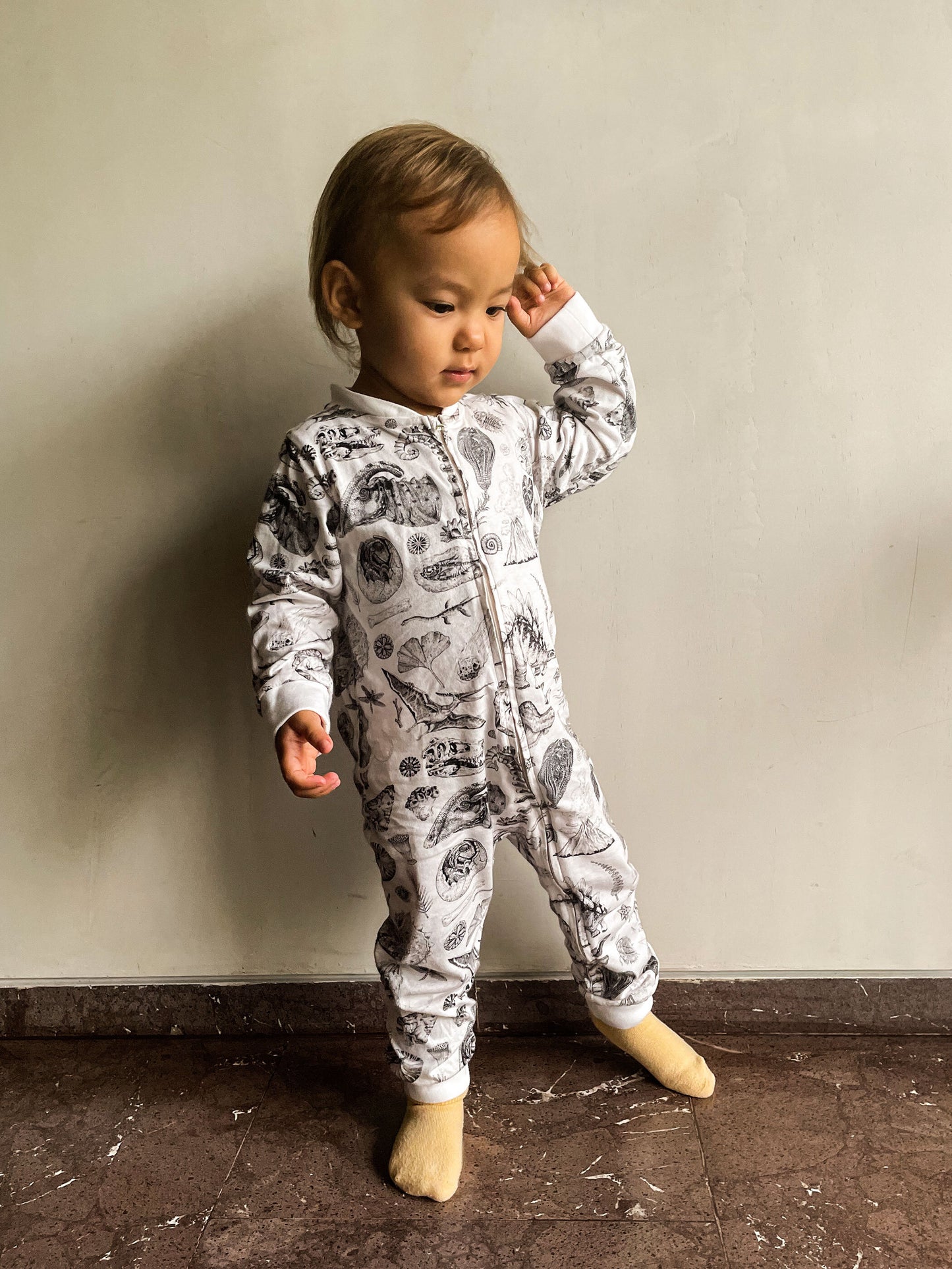 Babies or Explorers to be will sleep soundly in this lightweight soft cotton pyjama. Are you ready for prehistoric cuddles with your little one? This soft and comfy Onesie features prehistoric illustrations by Tattoo-Artist Suflanda!